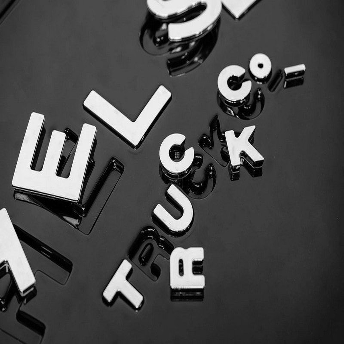 Kahn Design Mirror Lettering for Chelsea Truck Company Spare Wheel Cover