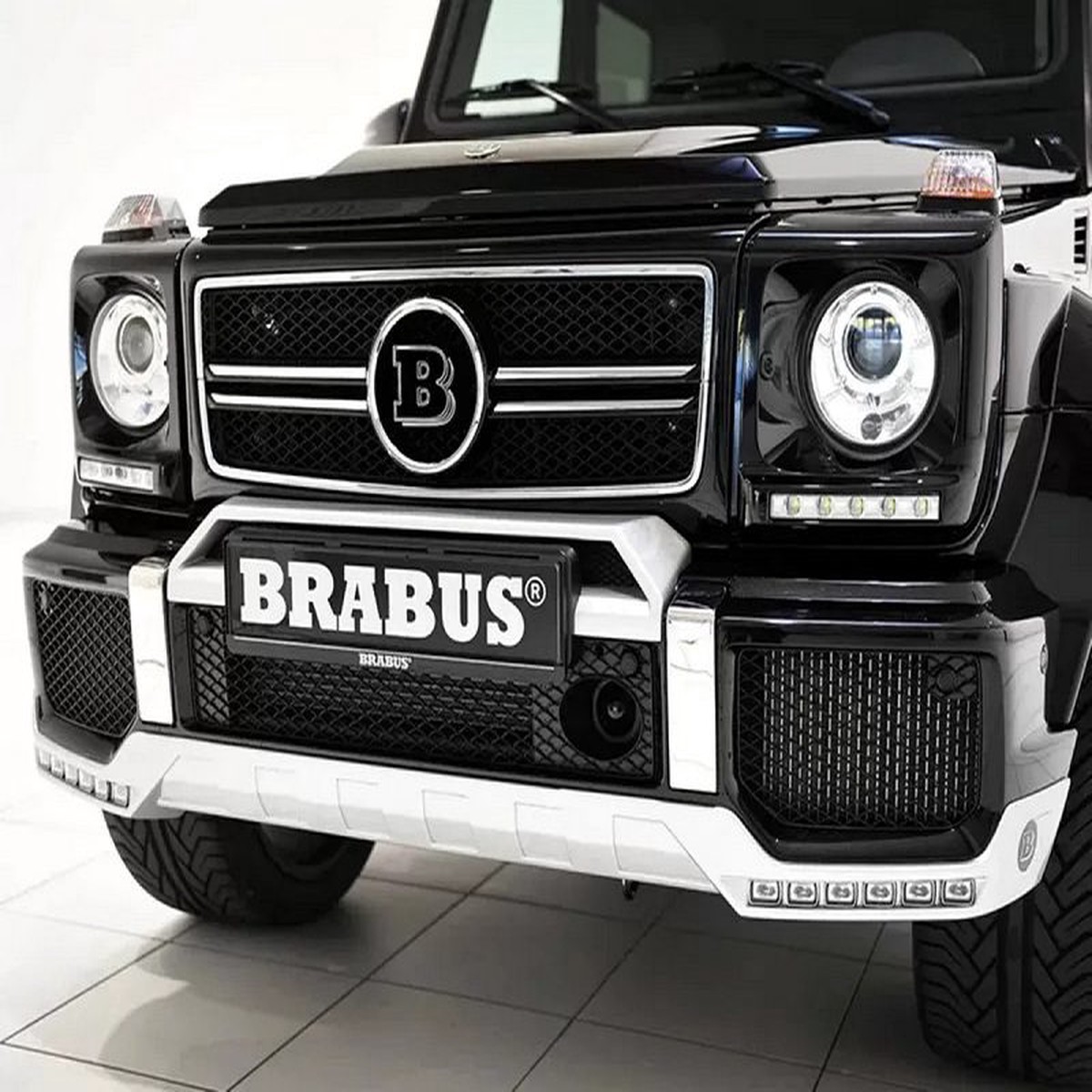 BRABUS Front Spoiler Lip incl. Daytime Running Lights Bright with Turn Signal Function for 2002-2018 W463